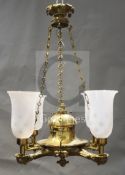 A bronze colza oil lamp, the circular bowl surmounted by a similar reservoir and with four reeded