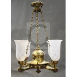 A bronze colza oil lamp, the circular bowl surmounted by a similar reservoir and with four reeded