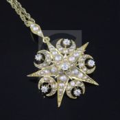 An Edwardian high carat gold, diamond and graduated split pearl set starburst and multi crescent