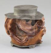 A Chinese rootwood and pewter mounted tea canister, 19th century, with an oval lift off lid, on four