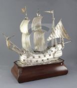 A George V silver model of an Elizabethan galleon, William Comyns & Sons, London 1913, in full sail,