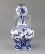 A 17th/18th century Delft garlic neck blue and white vase, 28cm