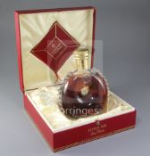 A bottle of Rémy Martin Louis XIII Grande champagne cognac, in Baccarat crystal decanter, initialled