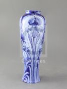 A Moorcroft Macintyre Florian ware tall baluster vase, in blue iris design, green signature W.