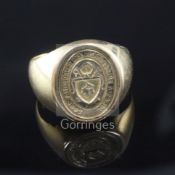 A 1970's high carat gold Bishop's ring, the carved intaglio matrix with crest and inscription,