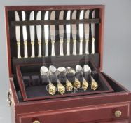 A comprehensive Golden Grande Baroque pattern parcel gilt sterling silver canteen of cutlery, by