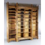 Attributed to A.W.N. Pugin. A mid 19th century Reformed Gothic oak breakfront open bookcase,