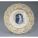A Mintons pate-sur-pate plate, by Alboin Birks, c.1905, the central panel decorated with a semi nude