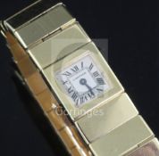 A lady's 18ct gold Cartier quartz bracelet watch, with signed square Roman dial and case back