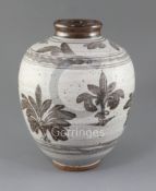 Malcolm Pepper. A stoneware studio vase, with brown plant motifs on a cream ground,