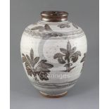 Malcolm Pepper. A stoneware studio vase, with brown plant motifs on a cream ground,