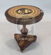 A Regency rosewood centre table, the lappet carved edge top inset with an etruscan style porcelain