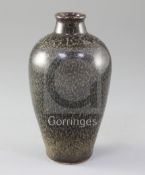 A Chinese Cizhou oil spot glazed meiping, Song dynasty, with a fine crackle to the glaze all over,