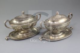 A pair of George III silver oval two handled sauce tureens, covers and stands by Tudor & Leader,