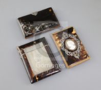 Three Victorian tortoiseshell and silver inlaid card cases, the first inset with a shell cameo