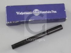 A Waterman's 'World's Smallest' safety pen, in hard black rubber with gold nib and original blue box