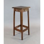 Attributed to Alfred Waterhouse. An oak jardiniere table, with moulded rectangular top and carved