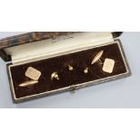 A pair of 9ct gold cufflinks and three 18ct gold dress studs.