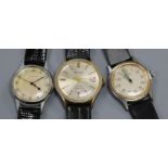 Three gentleman's assorted stainless steel wrist watches, including Longines and Roamer.