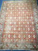A small Caucasian red ground rug 175cm x134cm