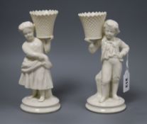 A pair of Belleek figures height 21.5cm