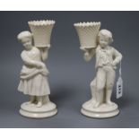 A pair of Belleek figures height 21.5cm