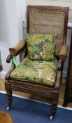 A William IV mahogany bergere library armchair