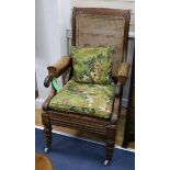 A William IV mahogany bergere library armchair
