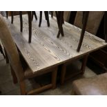 An Ash dining table with cast metal base 152 x 90cm