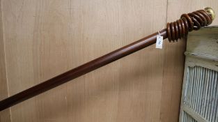 Three Jim Lawrence wooden curtain pole and rings W.295cm approx.