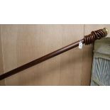 Three Jim Lawrence wooden curtain pole and rings W.295cm approx.