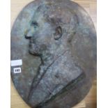 A bronze portrait relief signed "G. Van Der Straeten" length 53cm