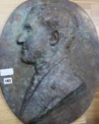 A bronze portrait relief signed "G. Van Der Straeten" length 53cm