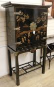 A Korean black lacquer drinks cabinet on stand W.94cm