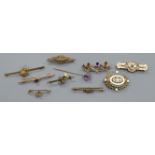 Eight Victorian and later 9ct gold and yellow metal brooches, a 15ct gold brooch and a stick pin.