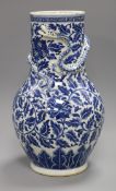 A late 19th century blue and white Chinese dragon vase height 35cm