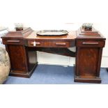 A William IV mahogany pedestal bowfront sideboard, with frieze drawer, the pedestals each with a