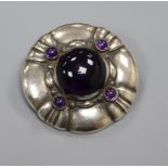 A Danish Georg Jensen sterling silver and amethyst cabochon set brooch, no 50, 40mm.