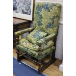 An 18th century French walnut armchair