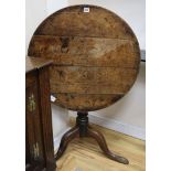 A George III oak tripod table W.73cm