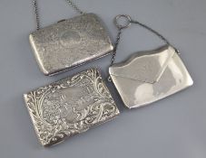 Two late Victorian/Edwardian silver mounted card purses, both with aide memoir and a George V silver
