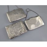 Two late Victorian/Edwardian silver mounted card purses, both with aide memoir and a George V silver