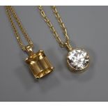 A 9ct gold and cubic zirconia pendant on 18ct gold chain and 9ct gold and citrine pendant on 14ct