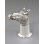 A 1970's textured silver stirrup cup, modelled as a horse's head, by Ralph H. Tugwood, with gilded