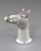 A 1970's textured silver stirrup cup, modelled as a horse's head, by Ralph H. Tugwood, with gilded
