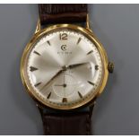 A gentleman's 18k gold Cyma Cymaflex manual wind wrist watch.