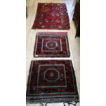 Two saddle bags and a Bokara rug Saddle bags 76 x 70cm and 74 x 72cm and rug 142 x 96cm