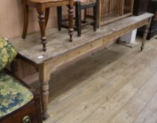 A Victorian long stripped pine table W.259cm