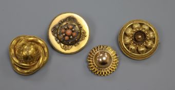 Three assorted Victorian yellow metal brooches and a similar coral set pendant brooch, largest