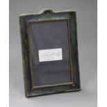 An Edwardian silver mounted photograph frame, Birmingham, 1909, 18.1cm.